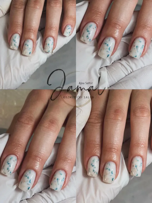 Cvjetni nail art u zelenim tonovima na mliječno bijeloj podlozi